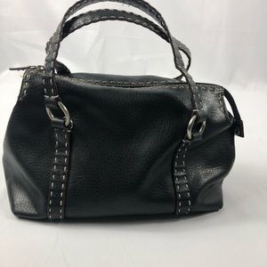Relic black purse with cream color stitching on handle & around top of bag.